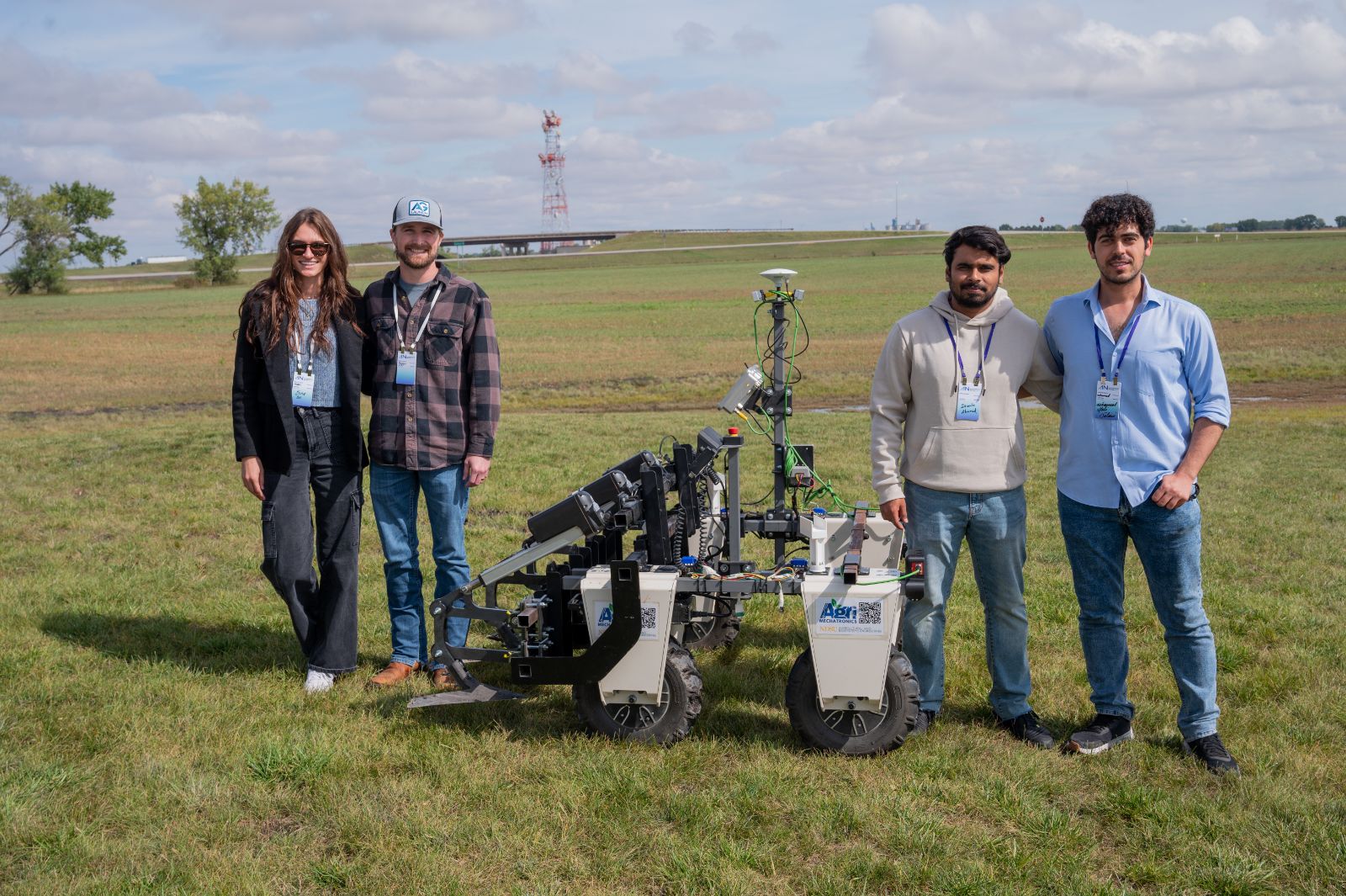 Lab team with the weeding robot at Autonomous Nation 2026