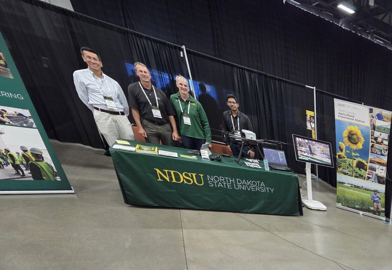 The NDSU team at the TechCon exhibit